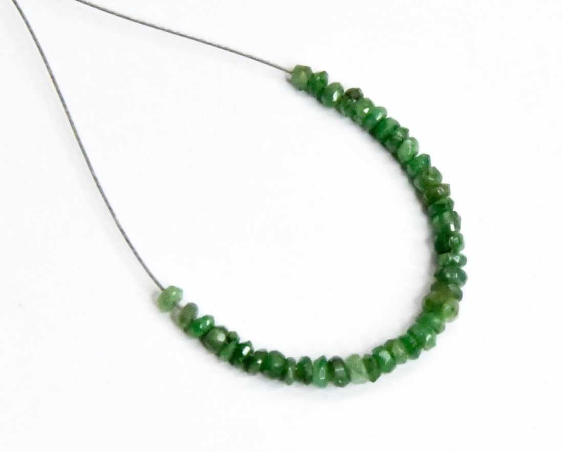 NATURAL TSAVORITE BEADS FACETED RONDELLE 2 - 3 MM, 38 PCS: These are natural, earth mined and hand crafted with precision. Stone: Tsavorite, Stone Shape: Faceted Rondelle, Stone Size: 2 - 3 mm, Width: 1 - 1.5 mm, Weight: approx. 2.50 carats. The photographs a