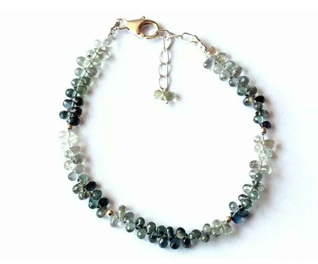 SOLID 925 SILVER BRACELET - NATURAL GREEN SAPPHIRE BEADS 6.5 - 7.5": These are natural, earth mined and hand crafted with precision. Stone: Sapphire, Stone Shape: Faceted Briolette, Stone Size: 2.5x3.5 - 2.5x5mm, Length: 6.5 - 7.5", Weight: approx. 24 carats. The photo