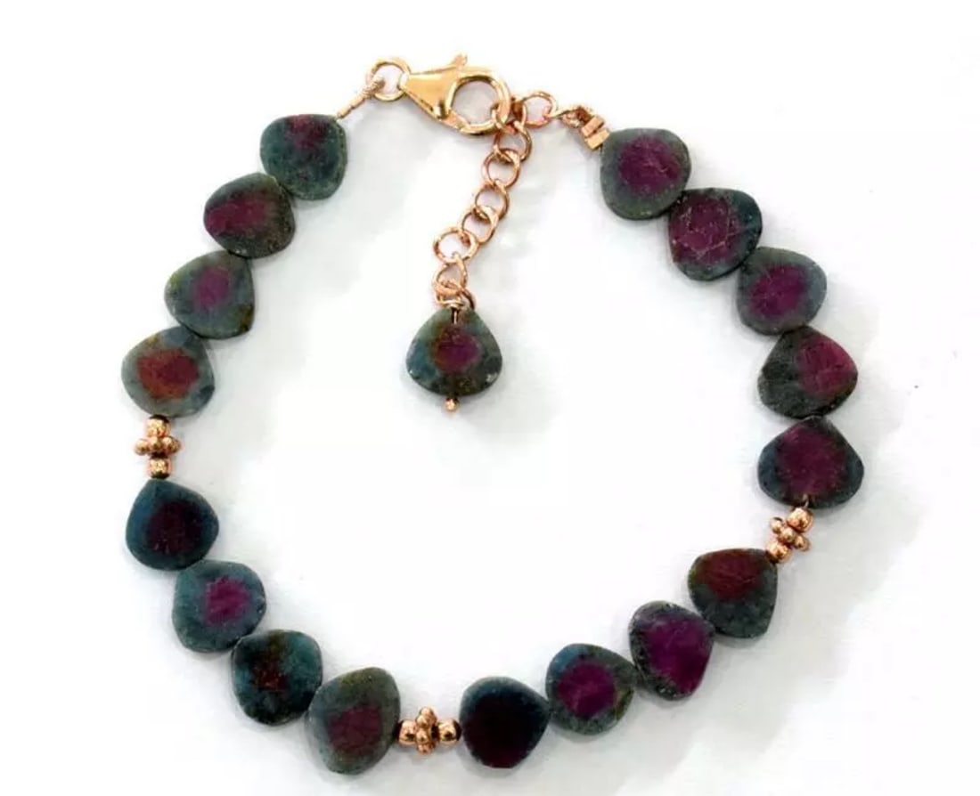 6.5 - 7.5" ROSE GOLD OVER 925 SILVER BRACELET - NATURAL RUBY ZOISITE BEADS: These are natural, earth mined and hand crafted with precision. Stone: Ruby Zosite, Stone Shape: Heart, Stone Size: 8 mm, Width - 2 - 3 mm, Length: 6.5 - 7.5", Weight: approx. 42 carats. The photograp