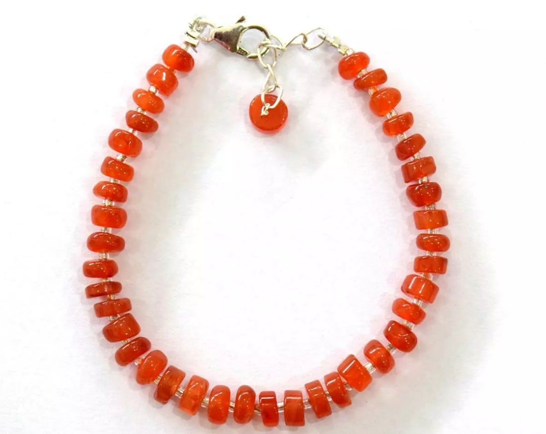 6.5 - 7.5" SOLID 925 SILVER BRACELET - NATURAL CARNELIAN BEADS TYRE: These are natural, earth mined and hand crafted with precision. Stone: Carnelian, Stone Shape: Tyre, Stone Size: 6 mm, Width - 2 - 3 mm, Length: 6.5 - 7.5", Weight: approx. 35 carats. The photographs