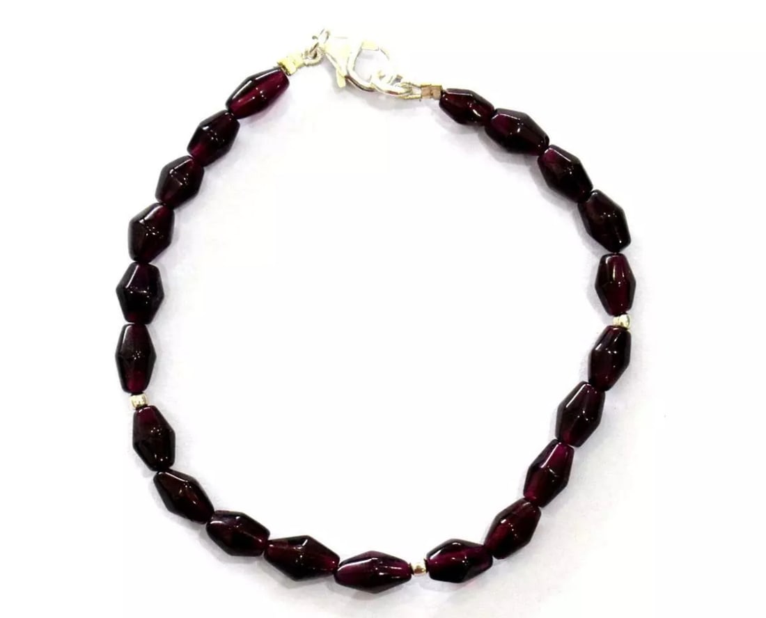 7" SOLID 925 SILVER BRACELET - NATURAL GARNET BEADS FANCY: These are natural, earth mined and hand crafted with precision. Stone: Garnet, Stone Shape: Fancy, Stone Size: 4x6 - 5x8 mm, Length: 7", Weight: approx. 38 carats. The photographs are generally enlarg