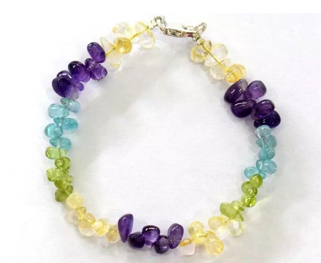 7" SOLID 925 SILVER BRACELET - NATURAL MULTI 4 COLOR BEADS BRIOLETTE: These are natural, earth mined and hand crafted with precision. Stone: Multi Gemstone, Stone Shape: Briolette, Stone Size: 3.5x5 - 4.5x7.5 mm, Length: 7", Weight: approx. 43 carats. The photographs ar