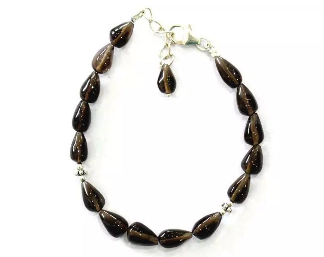 6.5 - 7.5" SOLID 925 SILVER BRACELET - NATURAL SMOKY QUARTZ BEADS: These are natural, earth mined and hand crafted with precision. Stone: Smoky Quartz, Stone Shape: Briolette, Stone Size: 5x8 - 6.5x9 mm, Length: 6.5 - 7.5", Weight: approx. 35 carats. The photographs