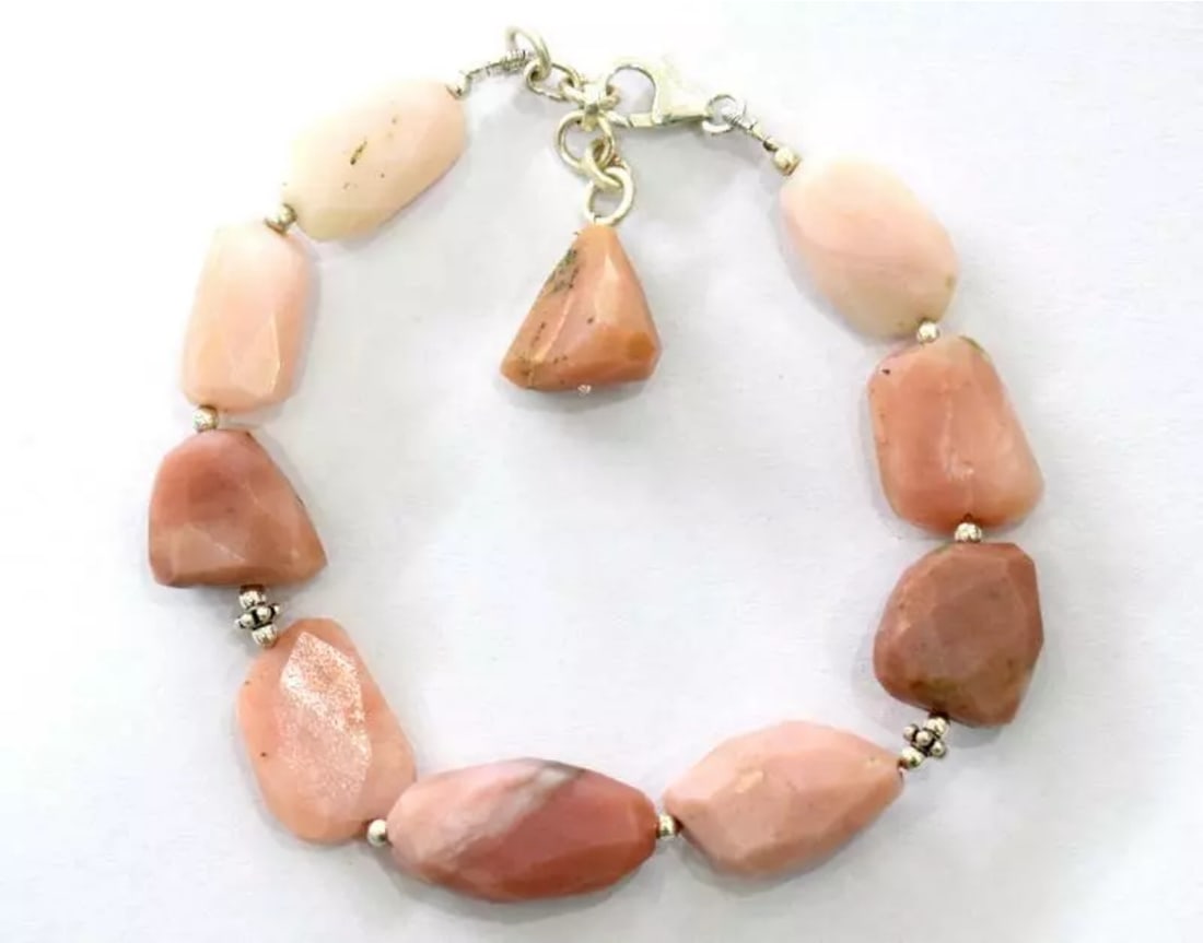 7 - 8" SOLID 925 SILVER BRACELET - NATURAL PINK OPAL BEADS FACETED TUMBLE: These are natural, earth mined and hand crafted with precision. Stone: Opal, Stone Shape: Stone Size: Faceted Tumble, Length: 7 - 8", Weight: approx. 84 carats. The photographs are generally enlarged