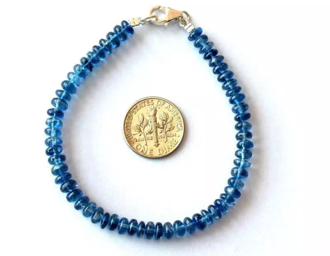 7" SOLID 925 SILVER BRACELET - NATURAL RARE KYANITE BEADS RONDELLE: These are natural, earth mined and hand crafted with precision. Stone: Kyanite, Stone Shape: Rondelle, Stone Size: 5 mm, Width - 2 - 2.5 mm, Length: 7", Weight: approx. 43 carats. The photographs are