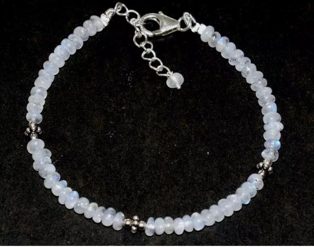 6.5 - 7.5" SOLID 925 SILVER BRACELET - NATURAL RAINBOW MOONSTONE BEADS: These are natural, earth mined and hand crafted with precision. Stone: Moonstone, Stone Shape: Rondelle, Stone Size: 4 mm, Width - 2 - 3 mm, Length: 6.5 - 7.5", Weight: approx. 24 carats. The photogra