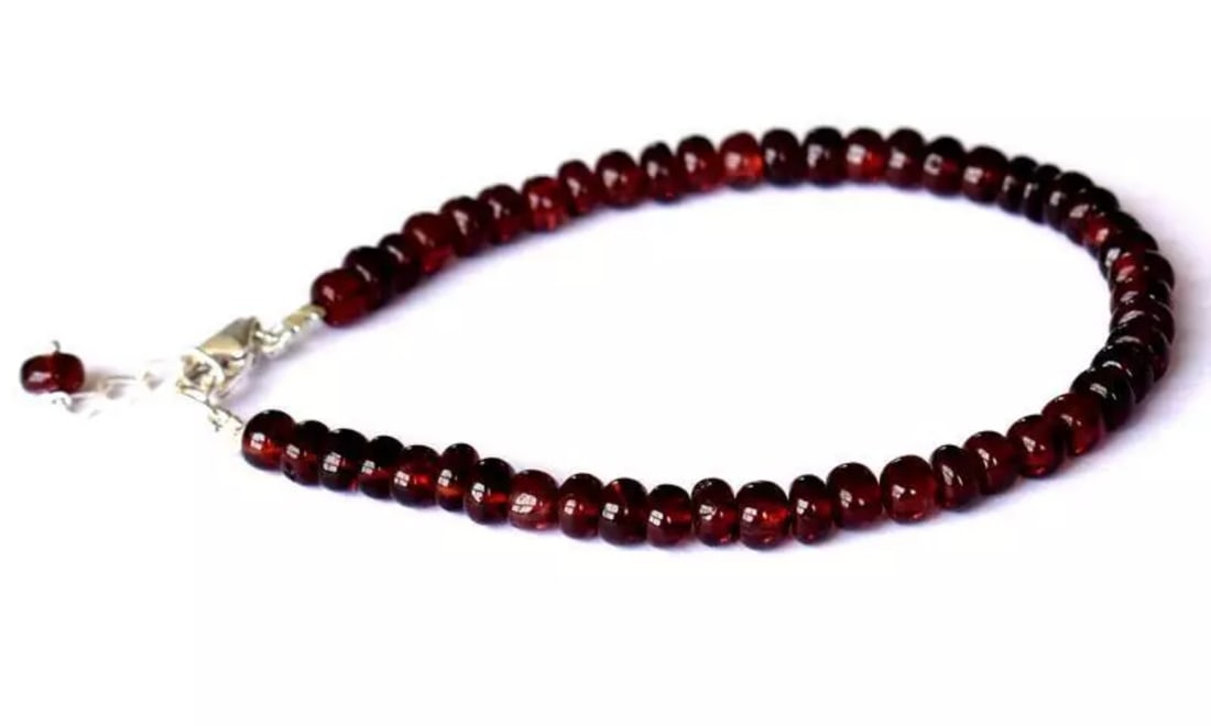 7 - 8" BRACELET NATURAL GARNET BEADS RONDELLE SOLID 925 SILVER: These are natural, earth mined and hand crafted with precision. Stone: Garnet, Stone Shape: Rondelle, Stone Size: 4.5 - 5mm, Width - 2.5 - 3.5mm, Length: 7 - 8", Weight: approx. 48 carats. The photogr
