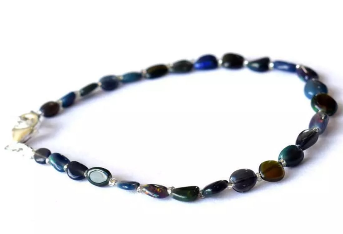 7.5" BRACELET NATURAL ETHIOPIAN OPAL BEADS FANCY SOLID 925 SILVER: These are natural, earth mined and hand crafted with precision. Stone: Ethiopian Opal, Stone Shape: Fancy, Stone Size: 3x4 - 4x8mm, Width - 2 - 3mm, Length: 7.5", Weight: approx. 12 carats. The photog
