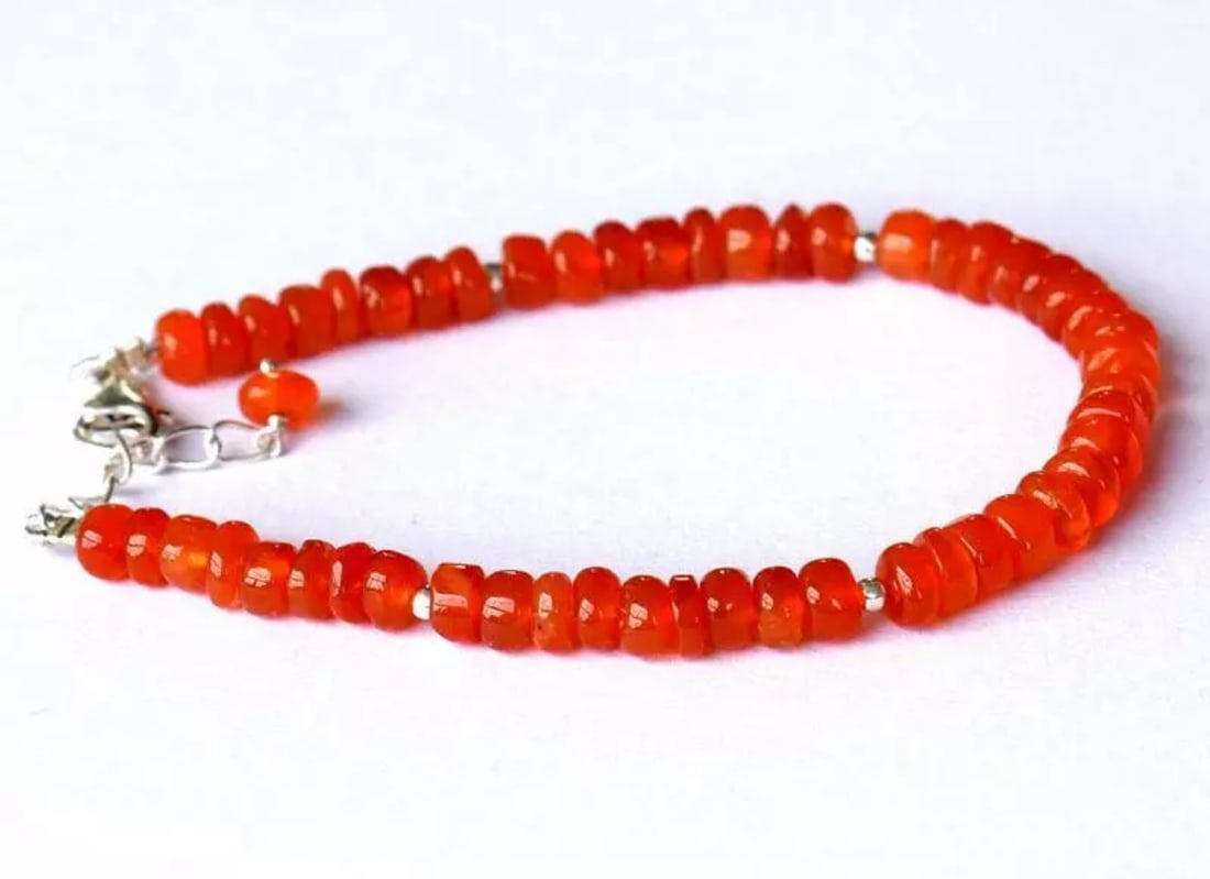 7 - 8" BRACELET NATURAL CARNELIAN BEADS HESHI SOLID 925 SILVER: These are natural, earth mined and hand crafted with precision. Stone: Carnelian, Stone Shape: Heshi, Stone Size: 5 - 5.5mm, Width - 2.5 - 3mm, Length: 7 - 8", Weight: approx. 42 carats. The photograp