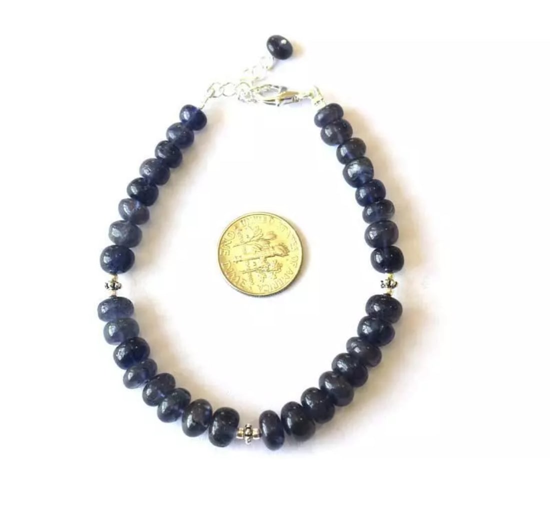 7.5 - 8.5" BRACELET NATURAL IOLITE BEADS RONDELLE SOLID 925 SILVER: These are natural, earth mined and hand crafted with precision. Stone: Iolite, Stone Shape: Rondelle, Stone Size: 6 - 8mm, Width - 3.5 - 5.5mm, Length: 7.5 - 8.5", Weight: approx. 69 carats. The photo