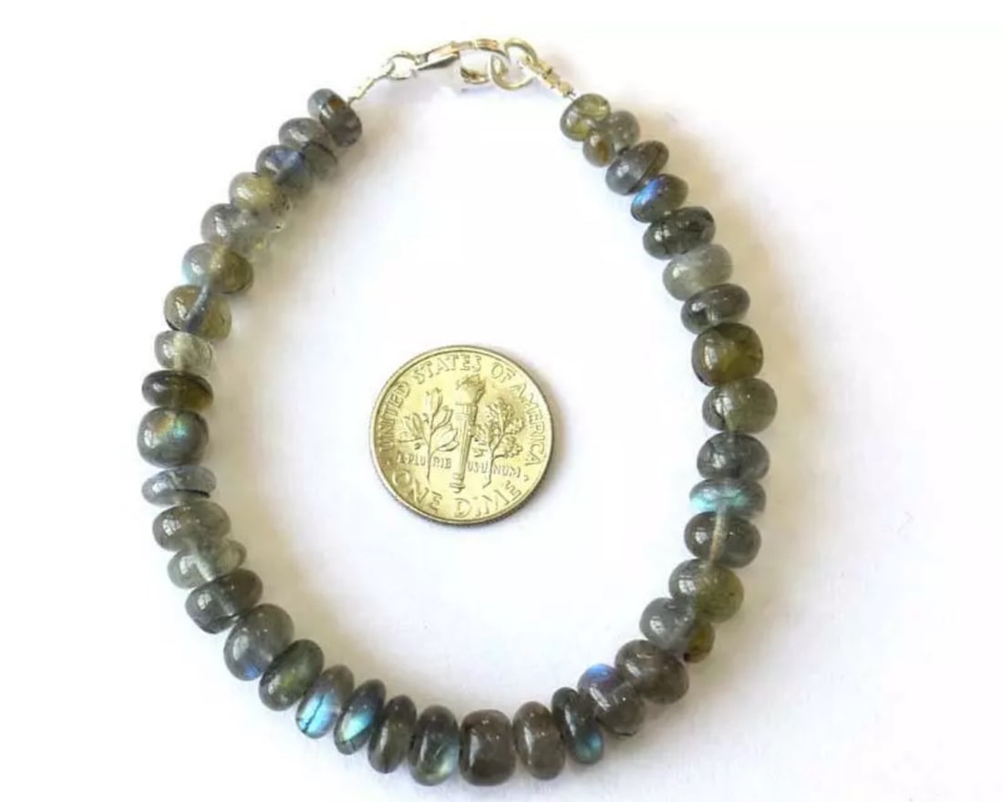7" BRACELET NATURAL LABRADORITE BEADS RONDELLE SOLID 925 SILVER: These are natural, earth mined and hand crafted with precision. Stone: Labradorite, Stone Shape: Rondelle, Stone Size: 6 - 7.5mm, Width - 4 - 5mm, Length: 7", Weight: approx. 67 carats. The photograph