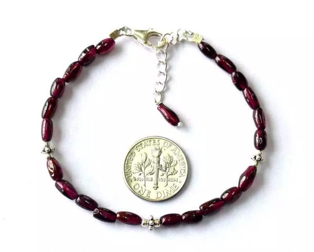6.5 - 7.5" BRACELET NATURAL GARNET BEADS FANCY SOLID 925 SILVER: These are natural, earth mined and hand crafted with precision. Stone: Garnet, Stone Shape: Fancy, Stone Size: 3.5x5 - 3.5x7mm, Length: 6.5 - 7.5", Weight: approx. 27 carats. The photographs are
