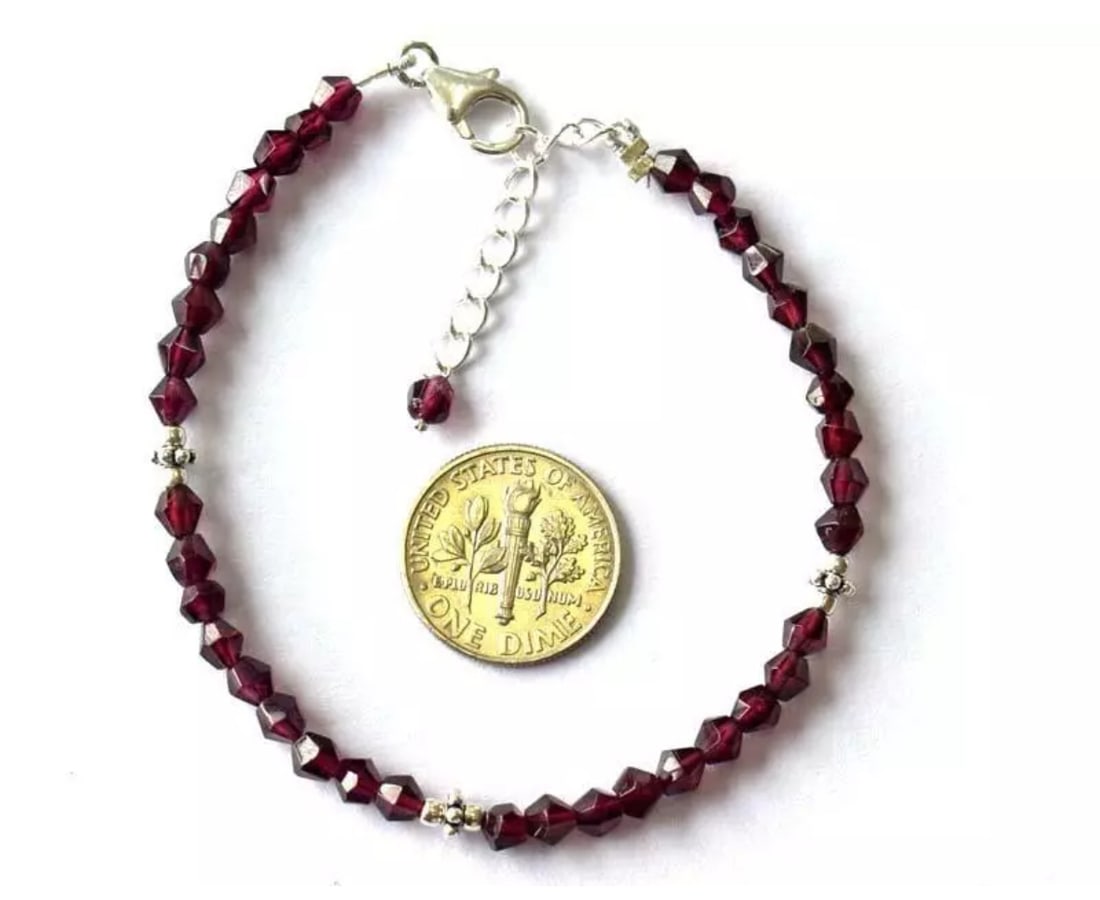 6.5 - 7.5" BRACELET NATURAL GARNET BEADS FACETED FANCY SOLID 925 SILVER: These are natural, earth mined and hand crafted with precision. Stone: Garnet, Stone Shape: Faceted Fancy, Stone Size: 3.5mm, Width - 3 - 3.5mm, Length: 6.5 - 7.5", Weight: approx. 26 carats. The phot