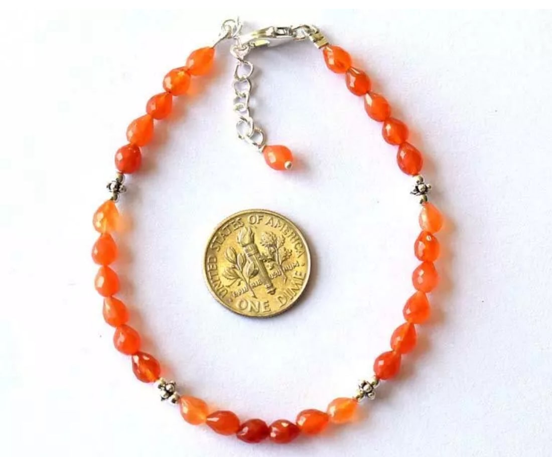 7 - 8" BRACELET NATURAL CARNELIAN BEADS BRIOLETTE SOLID 925 SILVER: These are natural, earth mined and hand crafted with precision. Stone: Carnelian, Stone Shape: Faceted Briolette, Stone Size: 4x5 - 4x5.5mm, Length: 7 - 8", Weight: approx. 24 carats. The photographs