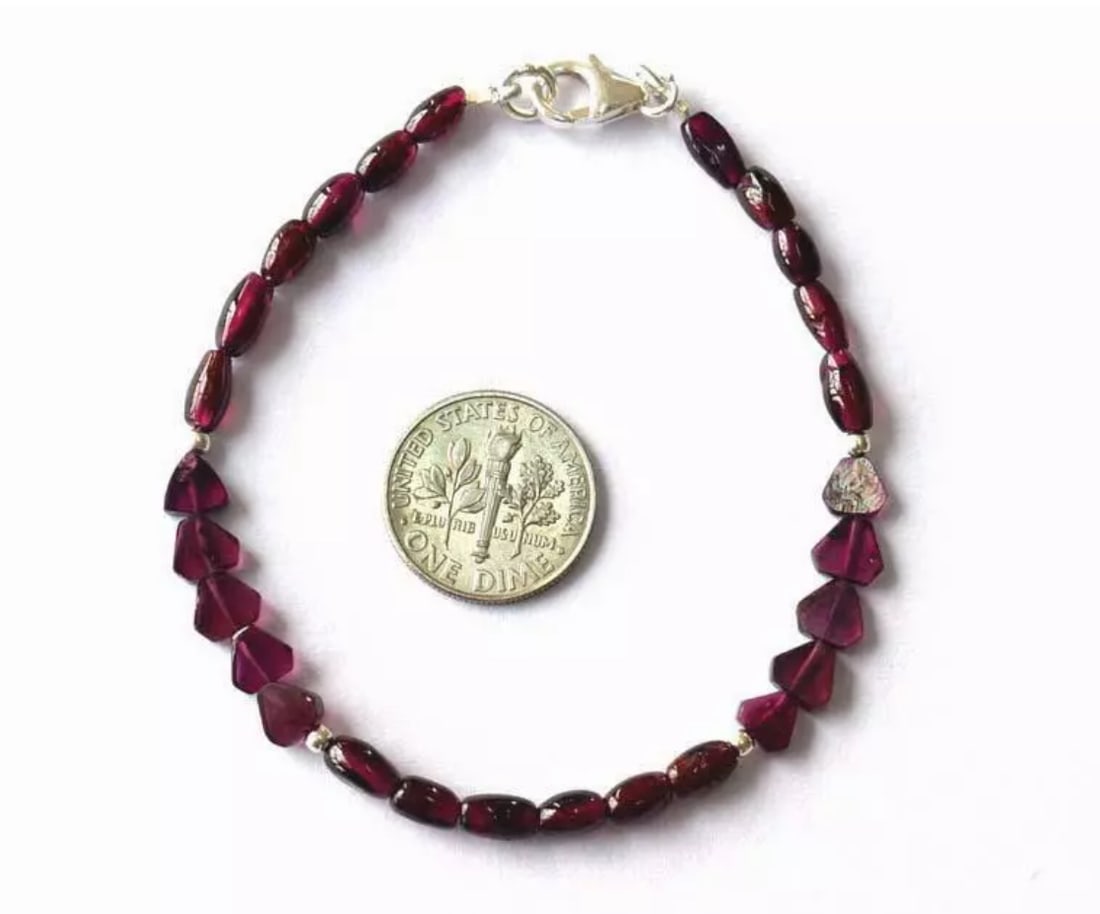 7" BRACELET NATURAL FINE GARNET BEADS FANCY SOLID 925 SILVER: These are natural, earth mined and hand crafted with precision. Stone: Garnet, Stone Shape: Fancy, Stone Size: 3x5 - 3.5x6.5mm/5.5 - 6mm, Length: 7", Weight: approx. 25 carats. The photographs are gen