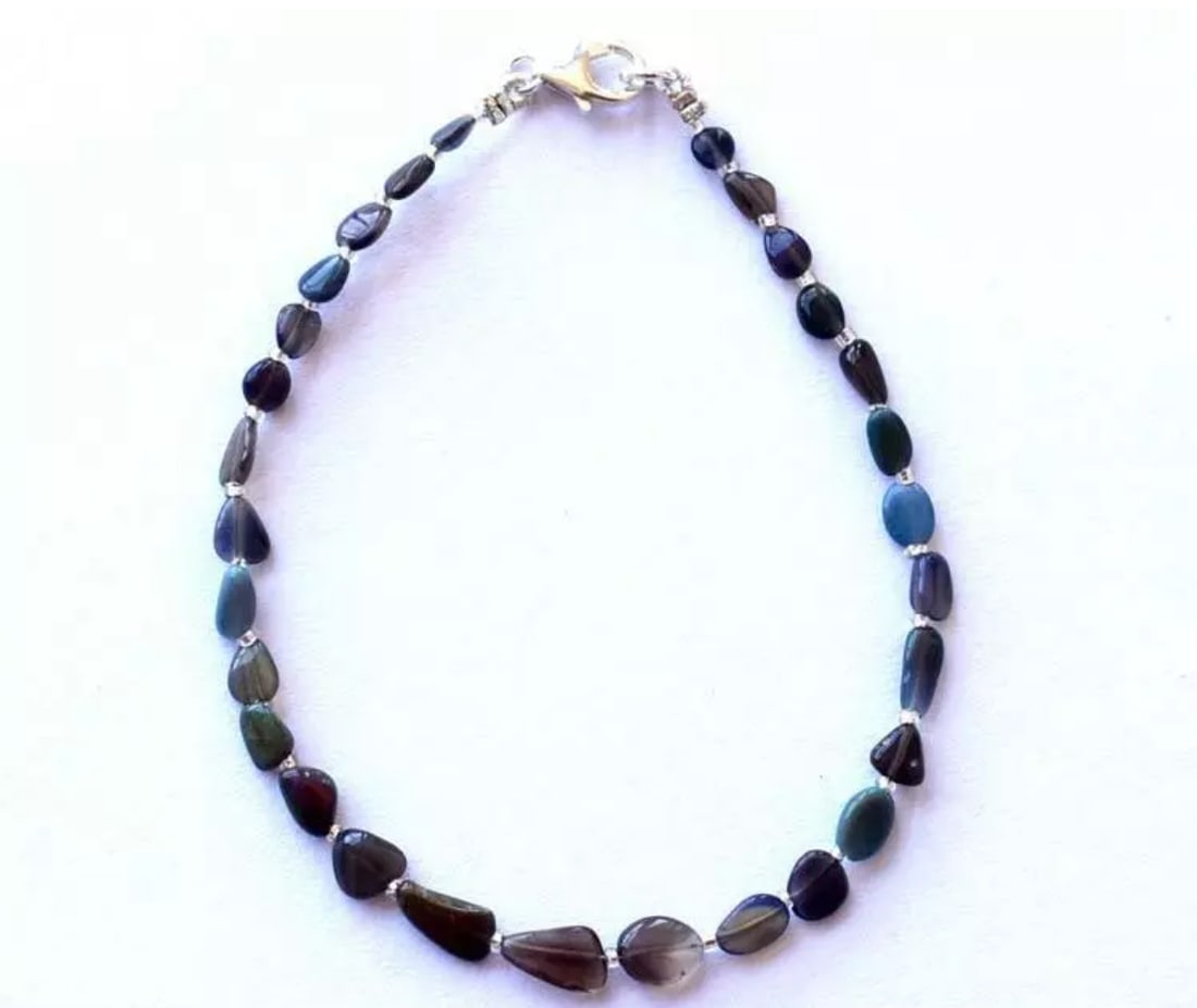 8" BRACELET NATURAL ETHIOPIAN OPAL BEADS TUMBLE SOLID 925 SILVER: These are natural, earth mined and hand crafted with precision. Stone: Opal, Stone Shape: Tumble, Stone Size: 3x4 - 5x8mm, Width - 2 - 2.5mm, Length: 8",Weight: approx. 12 carats. The photographs are