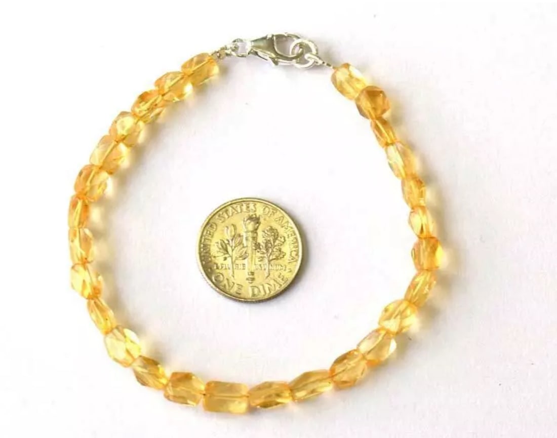 7" BRACELET NATURAL FINE CITRINE BEADS FACETED CUBE SOLID 925 SILVER: These are natural, earth mined and hand crafted with precision. Stone: Citrine, Stone Shape: Faceted Cube, Stone Size: 4.5x5 - 5x7mm, Width - 2.5 - 3mm, Length: 7", Weight: approx. 27 carats. The phot