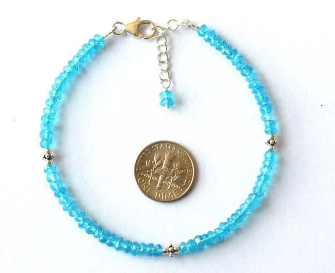 7 - 8" BRACELET SWISS BLUE TOPAZ (COATED) BEADS SOLID 925 SILVER: These are natural, earth mined and hand crafted with precision. Stone: Blue Topaz, Stone Shape: Faceted Rondelle, Stone Size: 4mm, Width - 1.5 - 2.5mm, Length: 7 - 8", Weight: approx. 30 carats. The p