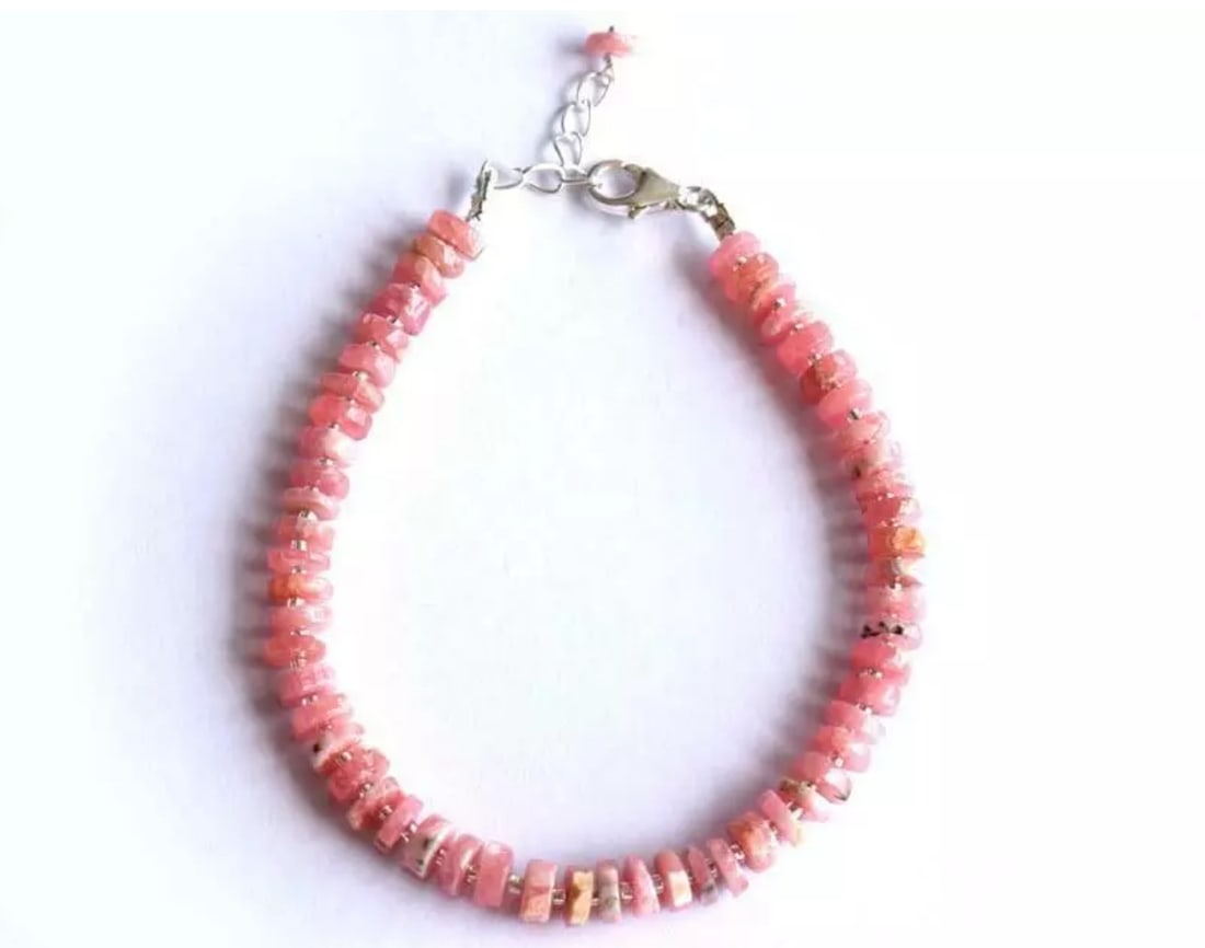 7 - 8" BRACELET NATURAL RHODOCHROSITE BEADS TYRE SOLID 925 SILVER: These are natural, earth mined and hand crafted with precision. Stone: Rhodochrosite, Stone Shape: Tyre, Stone Size: 5.5 mm , Width - 1 - 2 mm, Length: 7 - 8", Weight: approx. 51 carats. The photograp