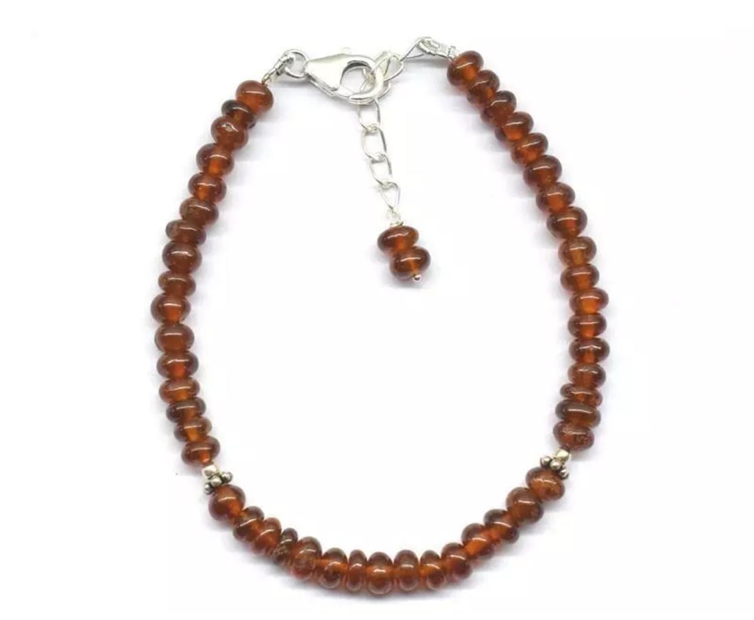 6.5 - 7.5" BRACELET NATURAL HESSONITE GARNET BEADS SOLID 925 SILVER: These are natural, earth mined and hand crafted with precision. Stone: Hessonite Garnet, Stone Shape: Rondelle, Stone Size: 4.5mm, Width - 3 - 4mm, Length: 6.5 - 7.5", Weight: approx. 41 carats. The p