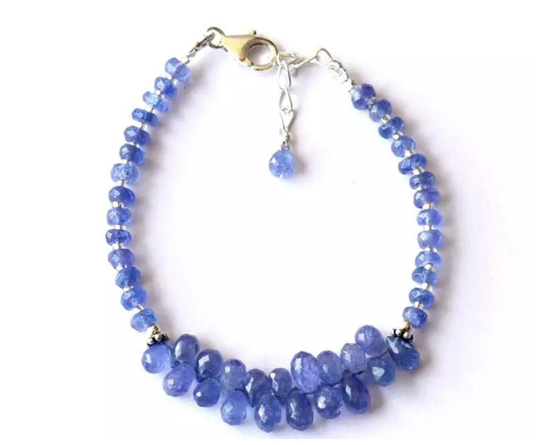 6.5 - 7.5" BRACELET NATURAL AA TANZANITE BEADS BRIOLETTE SOLID 925 SILVER: These are natural, earth mined and hand crafted with precision. Stone: Tanzanite, Stone Shape: Faceted Rondelle/Briolette, Stone Size: 4mm/4x6 - 4x7mm, Length: 6.5 - 7.5", Weight: approx. 35 carats. T