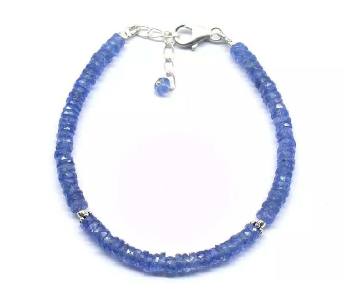 6.5 - 7.5" BRACELET NATURAL AA TANZANITE BEADS TYRE SOLID 925 SILVER: These are natural, earth mined and hand crafted with precision. Stone: Tanzanite, Stone Shape: Faceted Tyre, Stone Size: 4 - 4.5mm, Width - 1.5 - 2mm, Length: 6.5 - 7.5", Weight: approx. 35 carats. Th