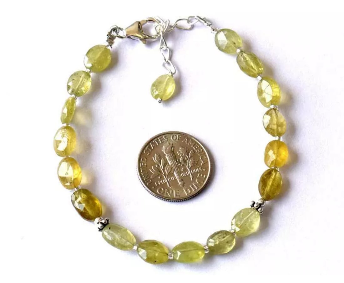 6.5 - 7.5" BRACELET NATURAL GROSSULAR GARNET BEADS SOLID 925 SILVER: These are natural, earth mined and hand crafted with precision. Stone: Grossular Garnet, Stone Shape: Faceted Oval, Stone Size: 5x7 - 6x8mm, Width - 3 - 4mm, Length: 6.5 - 7.5", Weight: approx. 31 car