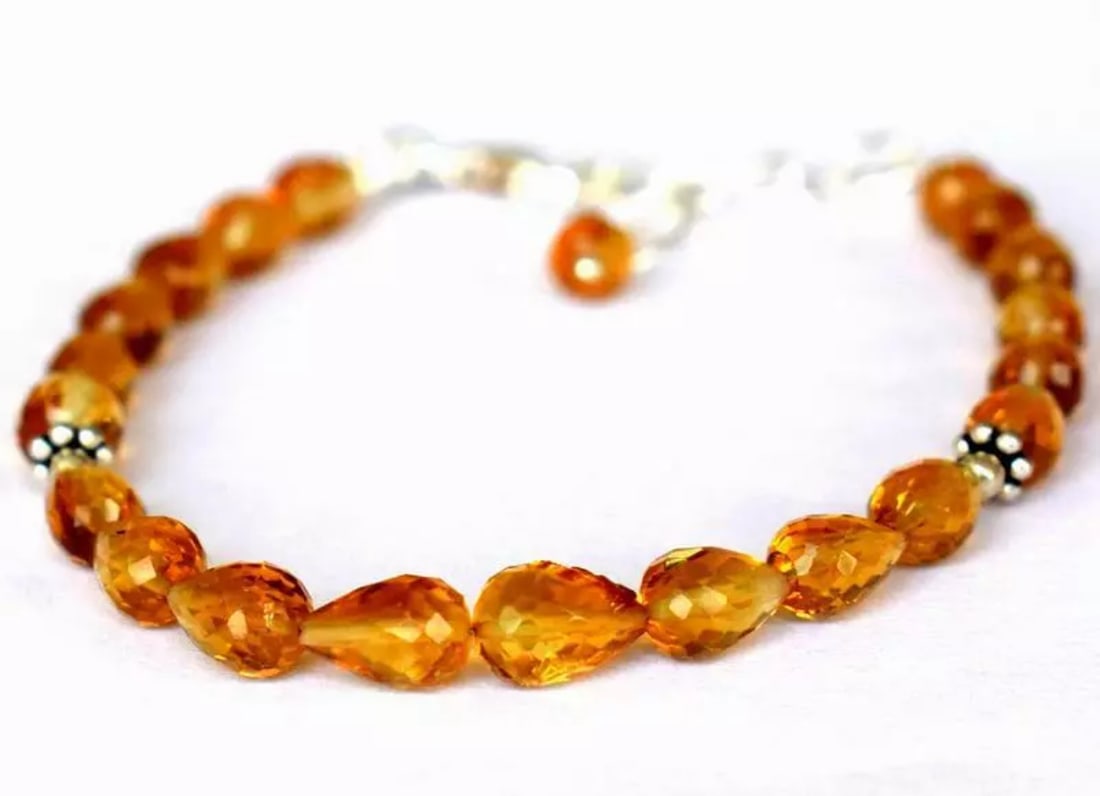 6.5 - 7.5" BRACELET NATURAL FINE CITRINE BEADS BRIOLETTE SOLID 925 SILVER: These are natural, earth mined and hand crafted with precision. Stone: Citrine, Stone Shape: Faceted Briolette, Stone Size: 4x6 - 5x7mm, Length: 6.5 - 7.5", Weight: approx. 25.50 carats. The photograp