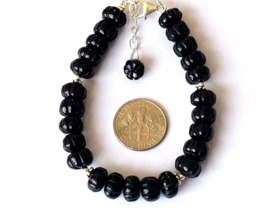 6.5 - 7.5" BRACELET NATURAL BLACK ONYX BEADS RONDELLE SOLID 925 SILVER: These are natural, earth mined and hand crafted with precision. Stone: Onyx, Stone Shape: Carved Rondelle, Stone Size: 7 - 8.5mm, Width - 5 - 6mm, Length: 6.5 - 7.5", Weight: approx. 81 carats. The ph