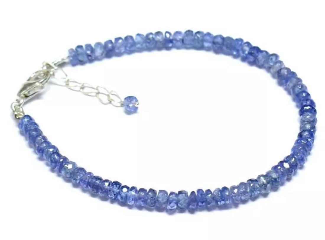 6.5 - 7.5" NATURAL TANZANITE BEADS RONDELLE SOLID 925 SILVER BRACELET: These are natural, earth mined and hand crafted with precision. Stone: Tanzanite, Shape: Faceted Rondelle, Size: 3.5 - 4 mm, Width - 2 - 2.5 mm, Length: 6.5 - 7.5", Weight: approx. 26 carats. The phot