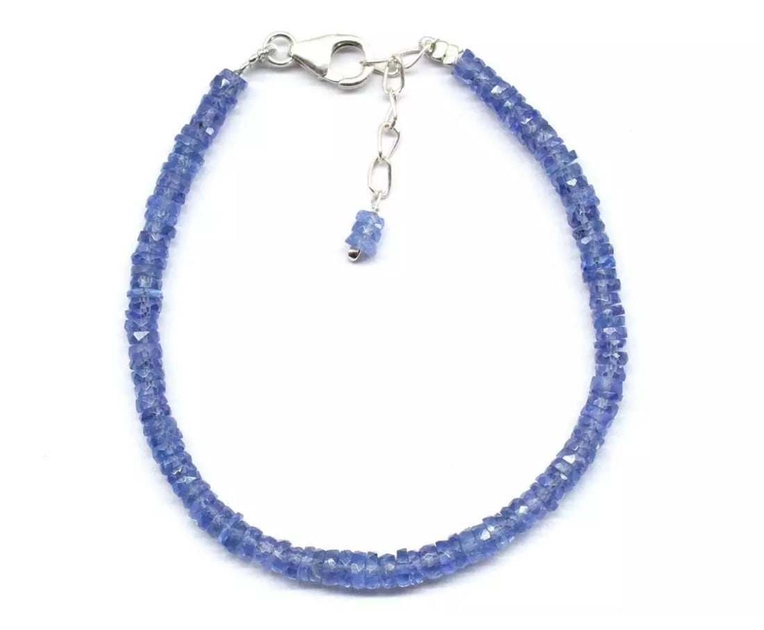 6.5 - 7.5" SOLID 925 SILVER BRACELET NATURAL AA TANZANITE BEADS TYRE: These are natural, earth mined and hand crafted with precision. Stone: Tanzanite, Shape: Faceted Tyre, Size: 3.5 - 4 mm, Width - 1 - 1.5 mm, Length: 6.5 - 7.5", Weight: approx. 28 carats. The photogra