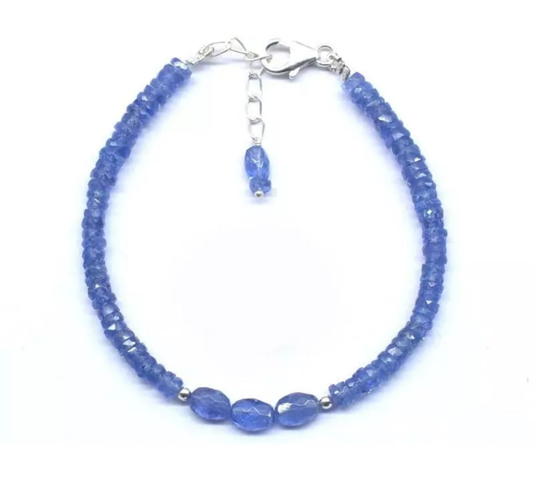 6.5 - 7.5" SOLID 925 SILVER BRACELET NATURAL TANZANITE BEADS TYRE/OVAL: These are natural, earth mined and hand crafted with precision. Stone: Tanzanite, Stone Shape: Faceted Tyre/Oval, Stone Size: 4 mm/4.5x6.5 - 5x7 mm, Width: 1.5 - 3.5 mm, Length: 6.5 - 7.5", Weight: ap