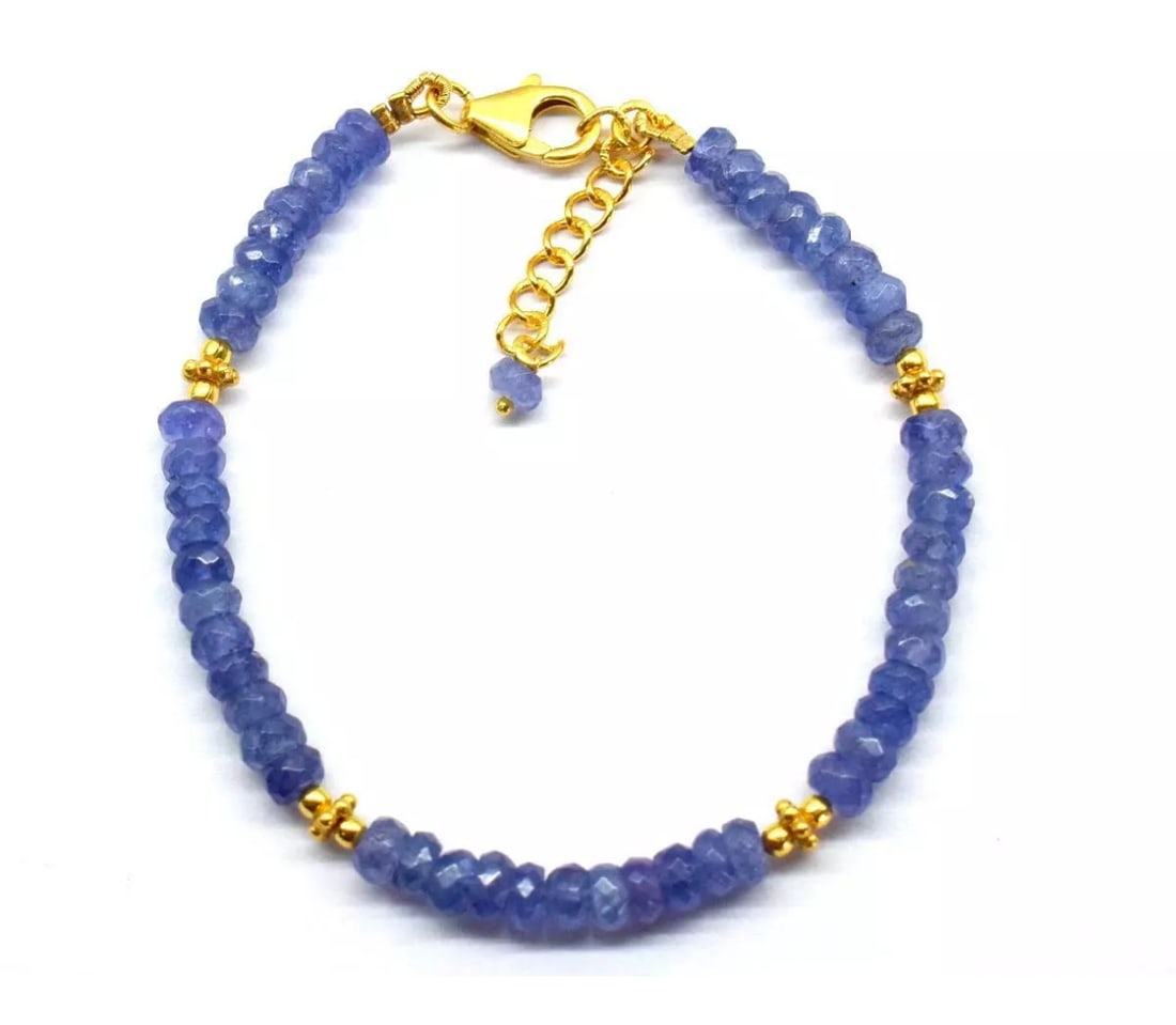 6.5 - 7.5" VERMEIL SOLID 925 SILVER BRACELET NATURAL TANZANITE BEADS: These are natural, earth mined and hand crafted with precision. Stone: Tanzanite, Shape: Faceted Rondelle, Size: 4 - 4.5 mm, Width - 2 - 2.5 mm, Length: 6.5 - 7.5", Weight: approx. 35 carats. The phot