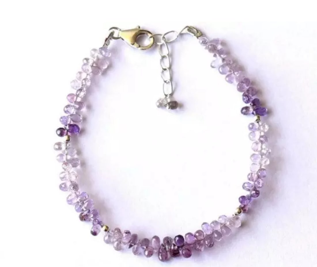 6.5 - 7.5" SOLID 925 SILVER BRACELET NATURAL PURPLE SAPPHIRE BEAD: These are natural, earth mined and hand crafted with precision. Stone: Purple Sapphire, Stone Shape: Faceted Briolette, Stone Size: 2x3.5 - 2.5x5 mm, Length: 6.5 - 7.5", Weight: approx. 25 carats. The