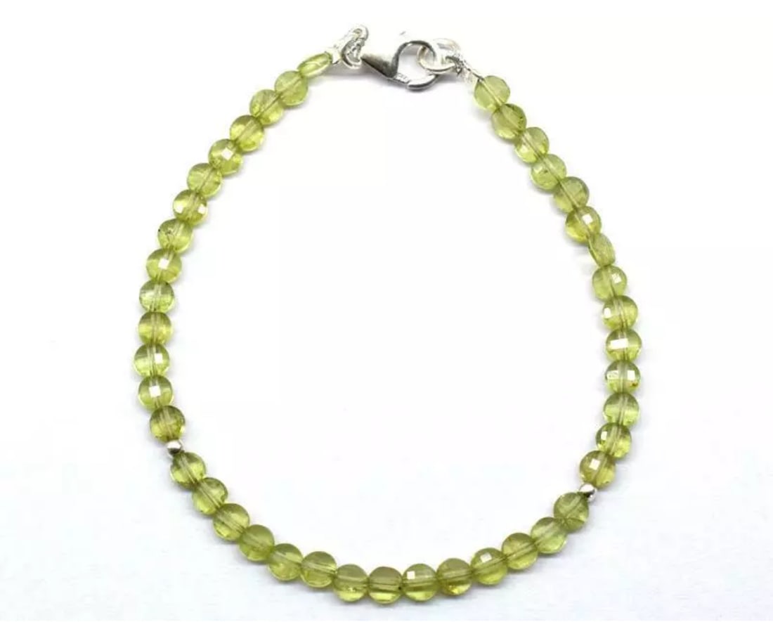 7" SOLID 925 SILVER BRACELET NATURAL PERIDOT BEADS FACETED COIN: These are natural, earth mined and hand crafted with precision. Stone: Peridot, Stone Shape: Faceted Coin, Stone Size: 4 mm, Width: 2 - 2.5 mm, Length: 7", Weight: approx. 17 carats. The photographs a