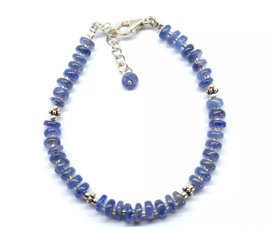 6.5 - 7.5" SOLID 925 SILVER BRACELET NATURAL TANZANITE BEADS TYRE: These are natural, earth mined and hand crafted with precision. Stone: Tanzanite, Stone Shape: Tyre, Stone Size: 5 - 5.5 mm, Width: 1 - 2.5 mm, Length: 6.5 - 7.5", Weight: approx. 38 carats. The photo