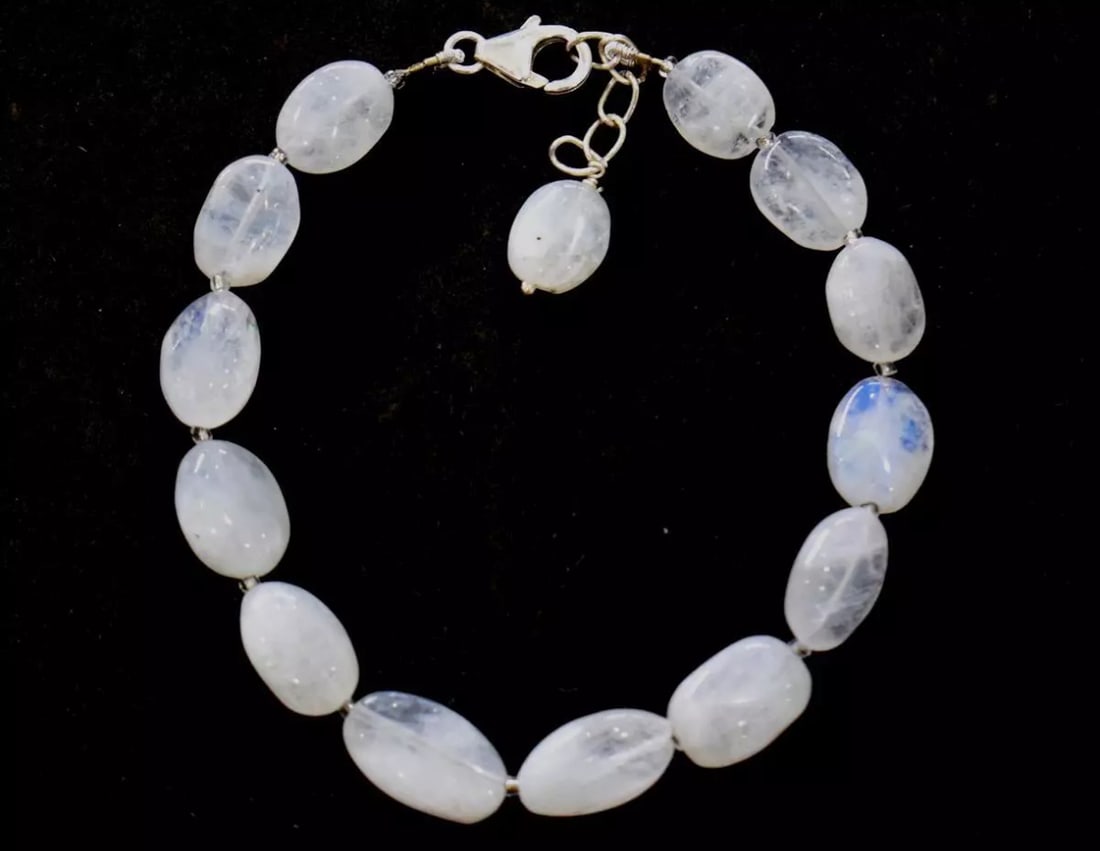 7 - 8" SOLID 925 SILVER BRACELET NATURAL RAINBOW MOONSTONE BEADS OVAL: These are natural, earth mined and hand crafted with precision. Stone: Moonstone, Stone Shape: Oval, Stone Size: 8x9.5 - 8.5x13 mm, Width: 4 - 6 mm, Length: 7 - 8", Weight: approx. 58 carats. The phot