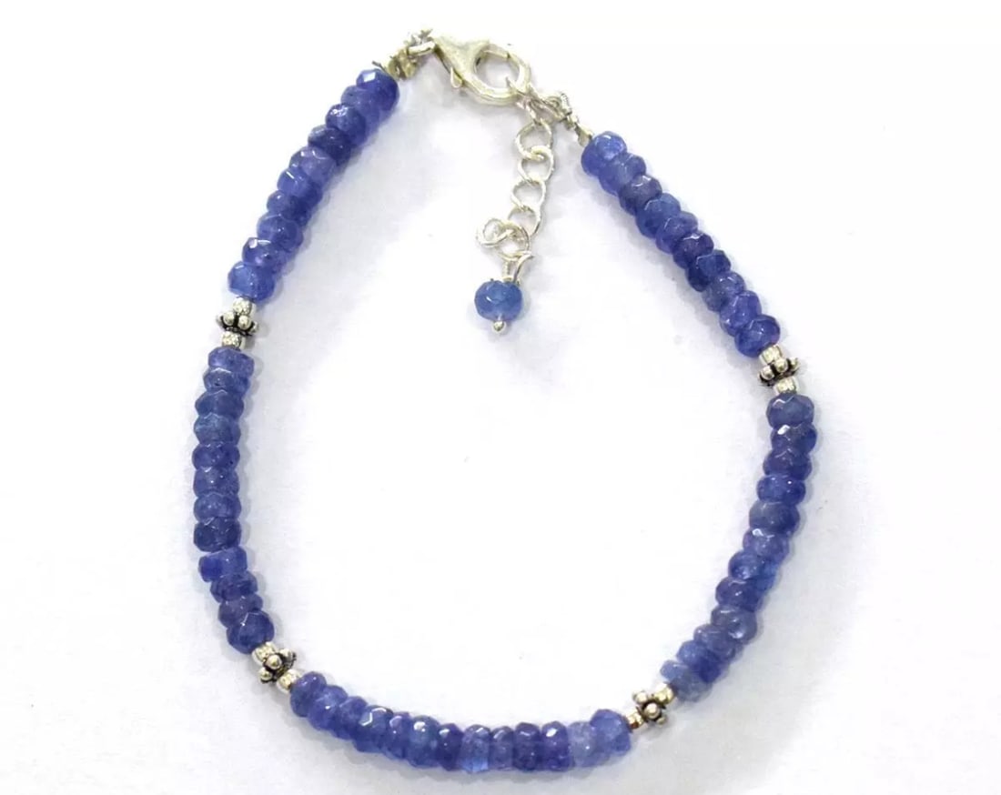 6.5 - 7.5" SOLID 925 SILVER BRACELET NATURAL TANZANITE BEADS RONDELLE: These are natural, earth mined and hand crafted with precision. Stone: Tanzanite, Stone Shape: Faceted Rondelle, Stone Size: 4 mm, Width: 2 - 2.5 mm, Length: 6.5 - 7.5", Weight: approx. 32 carats. The