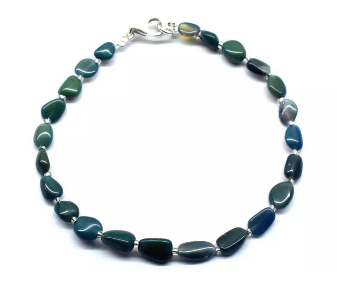 8" SOLID 925 SILVER BRACELET NATURAL ETHIOPIAN OPAL BEADS FANCY: These are natural, earth mined and hand crafted with precision. Stone: Opal, Stone Shape: Fancy, Stone Size: 4x5.5 - 6x8.5 mm, Width: 2 - 3 mm, Length: 8", Weight: approx. 15 carats. The photographs a