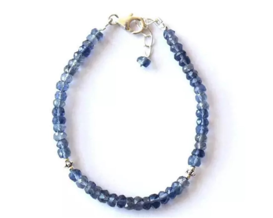 6.5 - 7.5" SOLID 925 SILVER BRACELET NATURAL IOLITE BEADS RONDELLE: These are natural, earth mined and hand crafted with precision. Stone: Iolite, Stone Shape: Faceted Rondelle, Stone Size: 4 - 4.5 mm, Width: 2 - 3 mm, Length: 6.5 - 7.5, Weight: approx. 26 carats. The