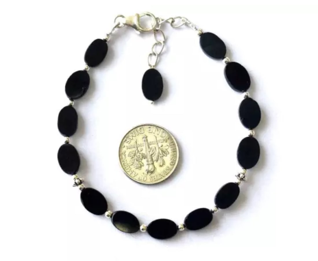 6.5 - 7.5" SOLID 925 SILVER BRACELET NATURAL BLACK SPINEL BEADS OVAL: These are natural, earth mined and hand crafted with precision. Stone: Black Spinel, Stone Shape: Oval, Stone Size: 5.5x8.5 - 6x9 mm, Width: 2 - 2.5 mm, Length: 6.5 - 7.5", Weight: approx. 30 carats.