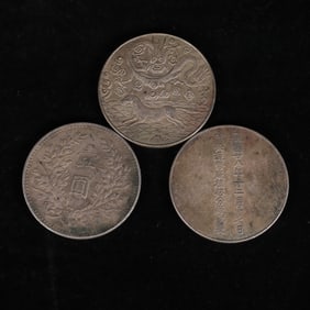 A set of Chinese silver dollars