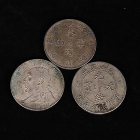 A set of Chinese silver dollars