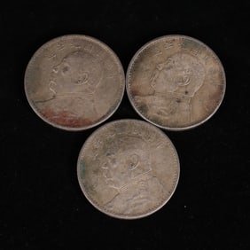 A set of Chinese silver dollars