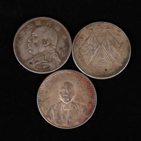 A set of Chinese silver dollars