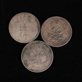 A set of Chinese silver dollars
