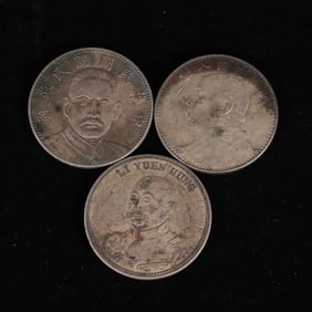 A set of Chinese silver dollars