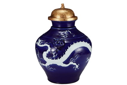 Sacrificial blue glaze jar with white dragon pattern and animal ears