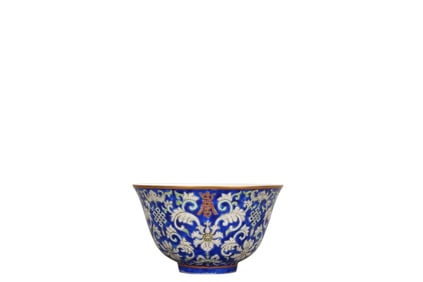 Blue-ground famille rose bowl with Baoxianghua and auspicious flowers