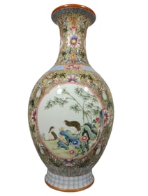 Enamel Guyuexuan windowed flower and bird vase